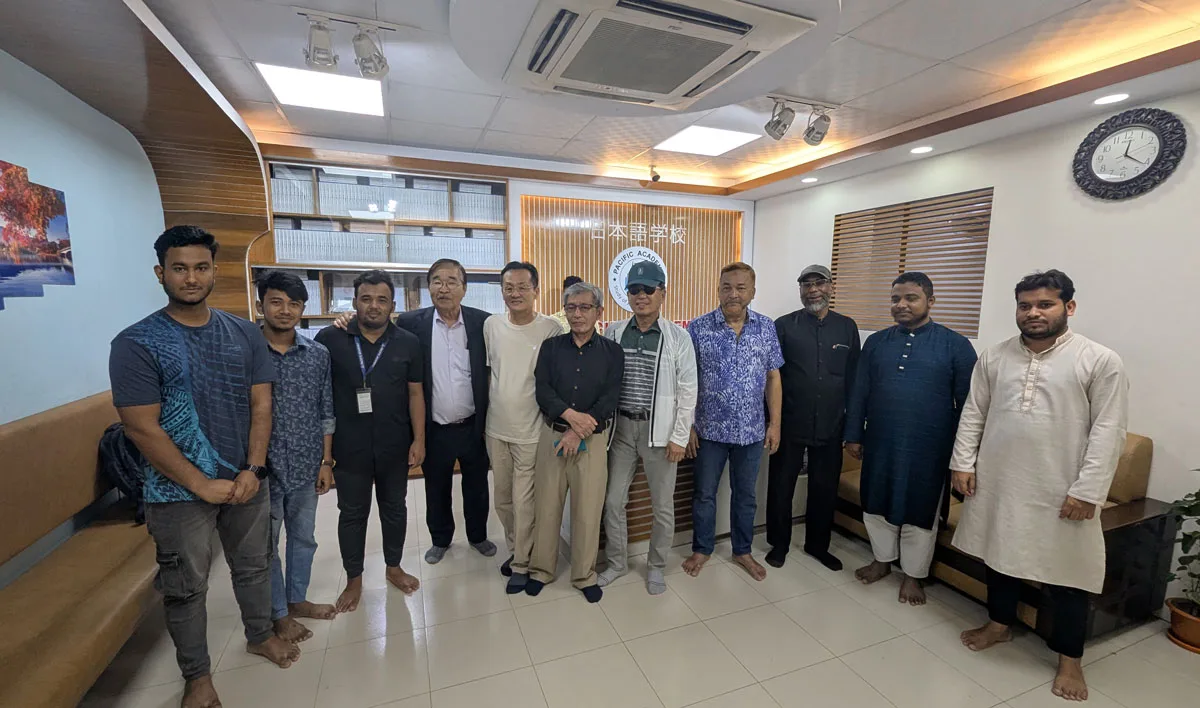 Team photo with students and staff during work visa support session